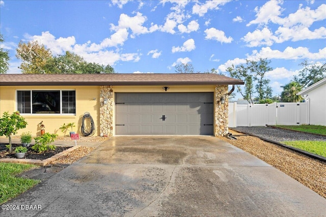 view of front of home with a garage