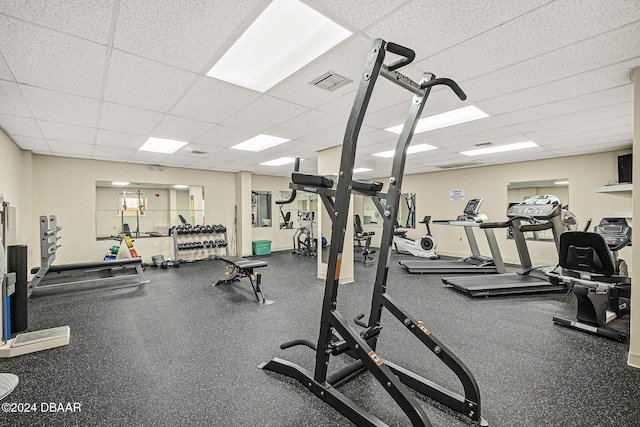 gym with a drop ceiling