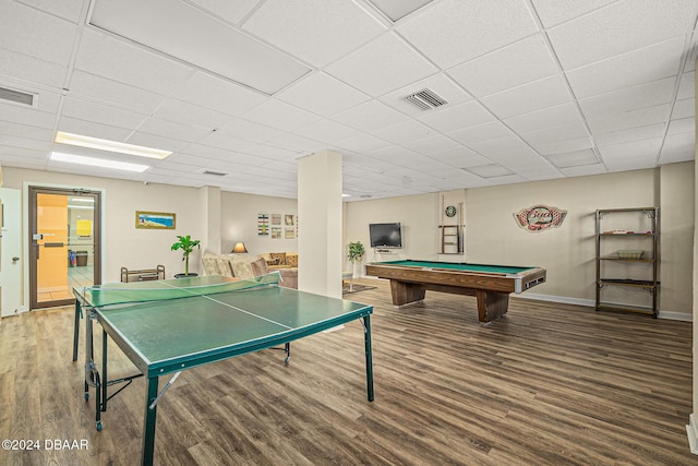 game room featuring hardwood / wood-style floors, a paneled ceiling, and pool table