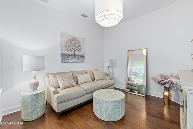 living room with dark wood-type flooring