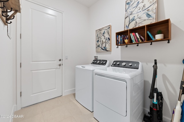 laundry room featuring separate washer and dryer