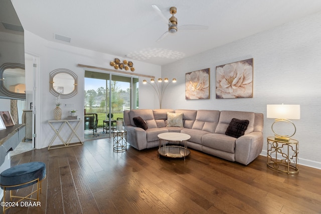 living room featuring ceiling fan and wood-type flooring