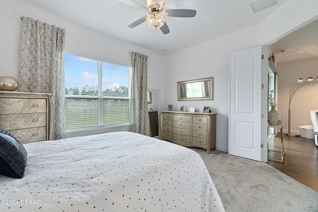 bedroom featuring hardwood / wood-style floors and ceiling fan