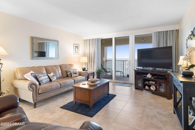 living room with light tile patterned floors