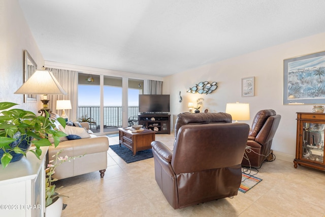 living room with light tile patterned floors