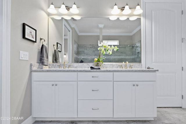 bathroom featuring vanity, crown molding, and a shower with shower door