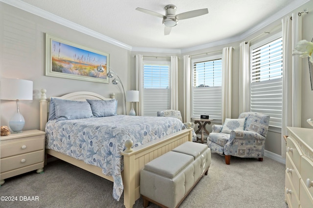 bedroom featuring light carpet, multiple windows, ceiling fan, and ornamental molding