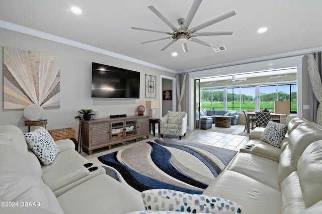 tiled living room with crown molding and ceiling fan