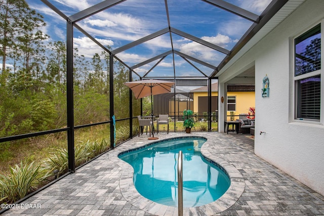 310 Coral Reef Way, Daytona Beach, FL 32124 - outdoor pool with a lanai and a patio