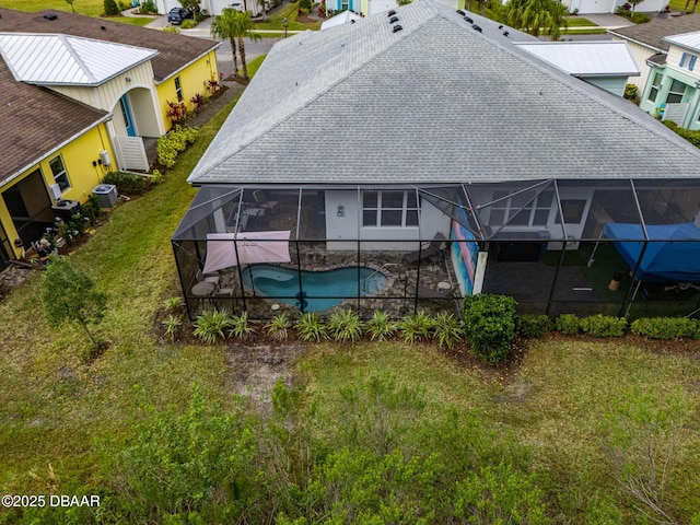 310 Coral Reef Way, Daytona Beach, FL 32124 - rear view of property with an outdoor pool, a lanai, cooling unit, a yard, and a patio area