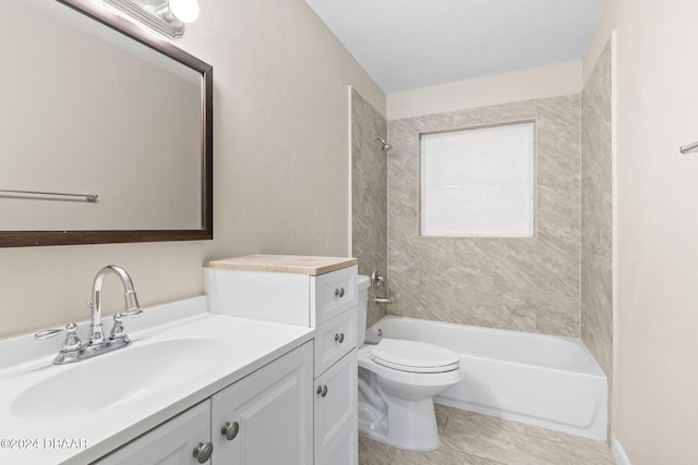 full bathroom featuring tile patterned floors, vanity, toilet, and tiled shower / bath