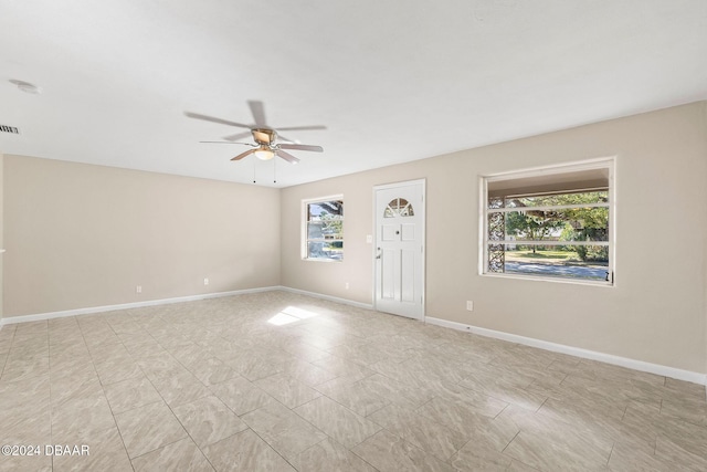 empty room with ceiling fan