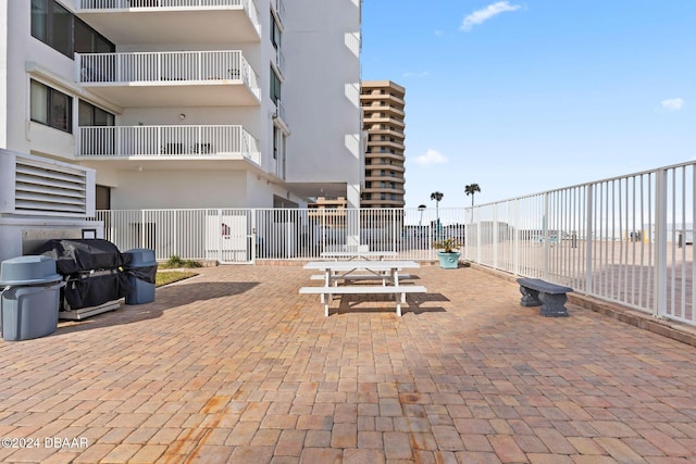 view of patio featuring a grill