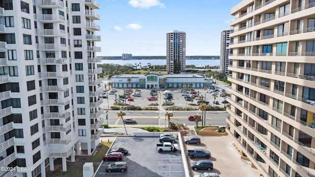 property's view of city featuring a water view