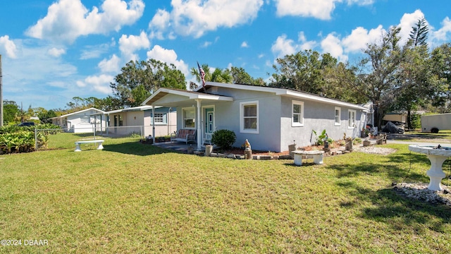 view of front facade with a front lawn