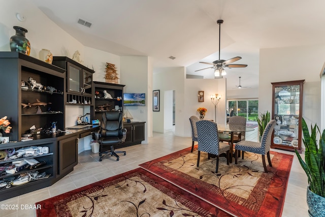 414 Long Cove Ct, Ormond Beach, FL 32174 - dining area featuring light tile patterned floors, a ceiling fan, built in study area, and lofted ceiling
