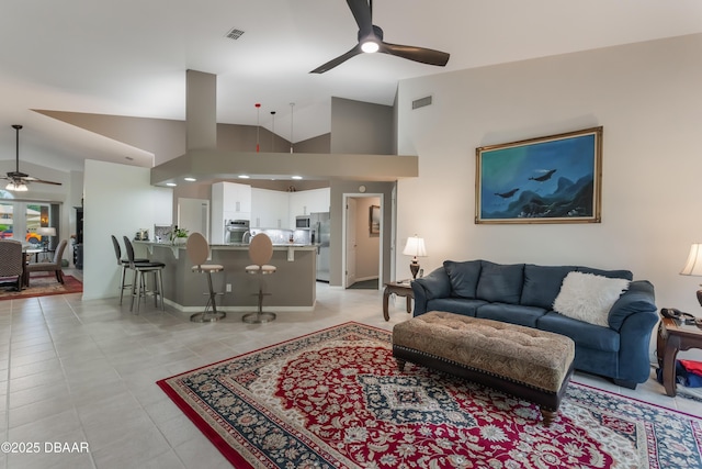 414 Long Cove Ct, Ormond Beach, FL 32174 - living area featuring ceiling fan, vaulted ceiling, and light tile patterned floors