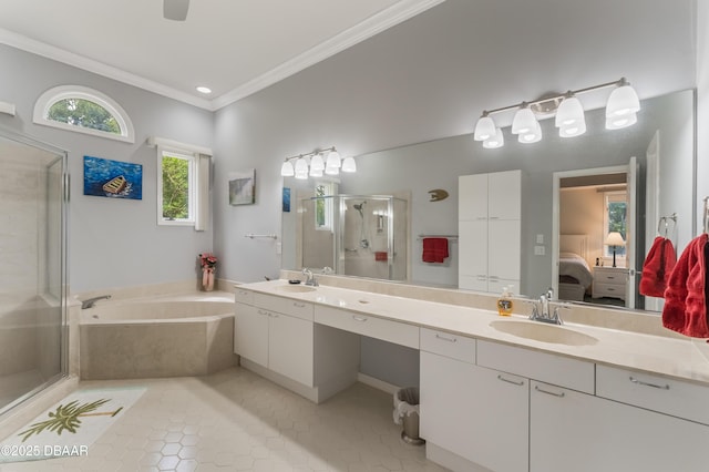 414 Long Cove Ct, Ormond Beach, FL 32174 - ensuite bathroom featuring a shower stall, double vanity, a garden tub, crown molding, and tile patterned flooring