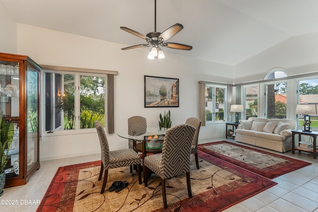 414 Long Cove Ct, Ormond Beach, FL 32174 - dining room with healthy amount of natural light, lofted ceiling, light tile patterned floors, and ceiling fan