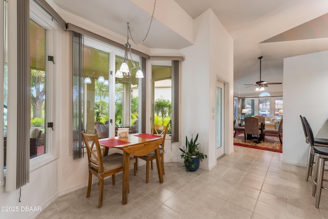 414 Long Cove Ct, Ormond Beach, FL 32174 - dining room featuring light tile patterned floors, a ceiling fan, and vaulted ceiling