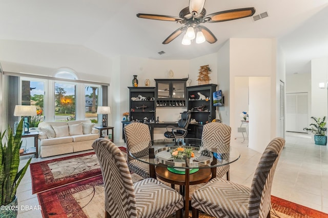 414 Long Cove Ct, Ormond Beach, FL 32174 - dining space featuring ceiling fan, vaulted ceiling, and tile patterned flooring