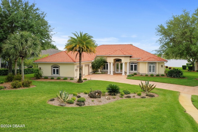 rear view of house with a lawn