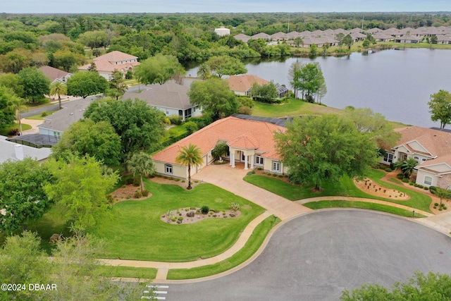 birds eye view of property featuring a water view