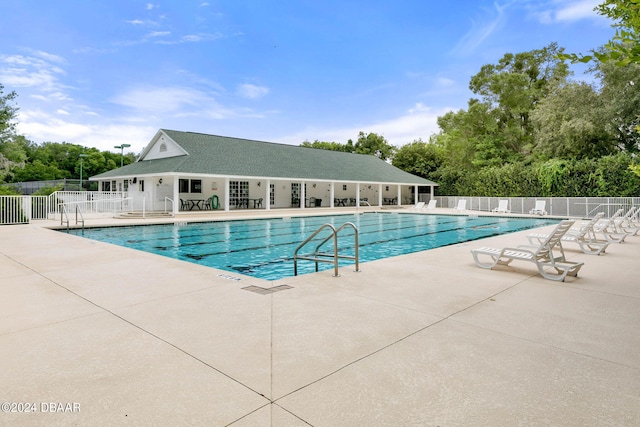 view of pool featuring a patio