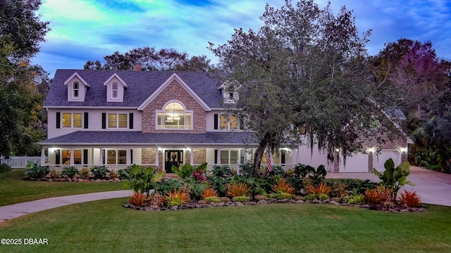 view of front of property with a lawn