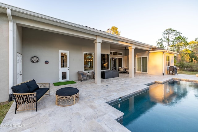 view of pool featuring a patio and an outdoor hangout area