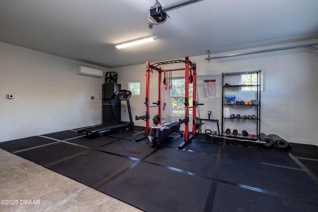 exercise room with a wall unit AC