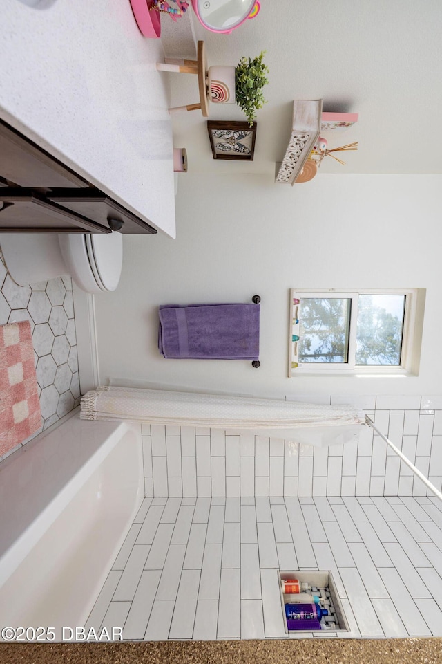 bathroom with ceiling fan