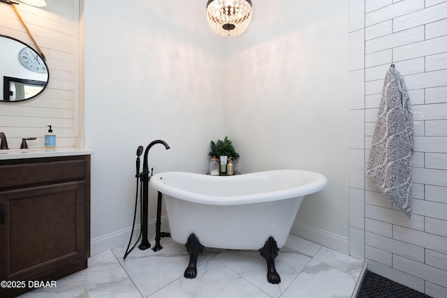 bathroom featuring vanity and a bathing tub