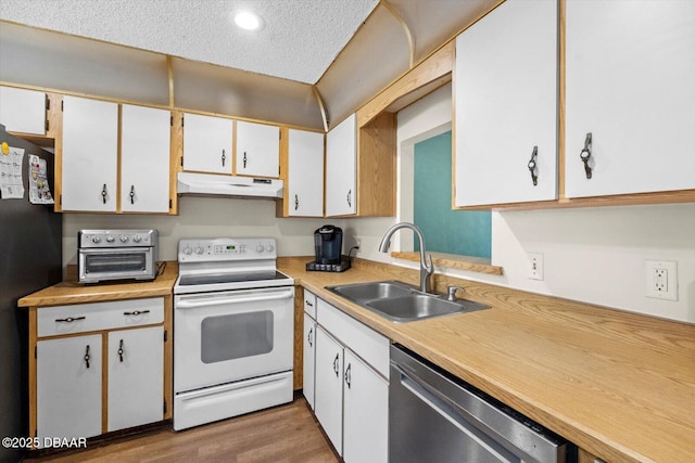 kitchen with dishwasher, a sink, light countertops, electric stove, and under cabinet range hood