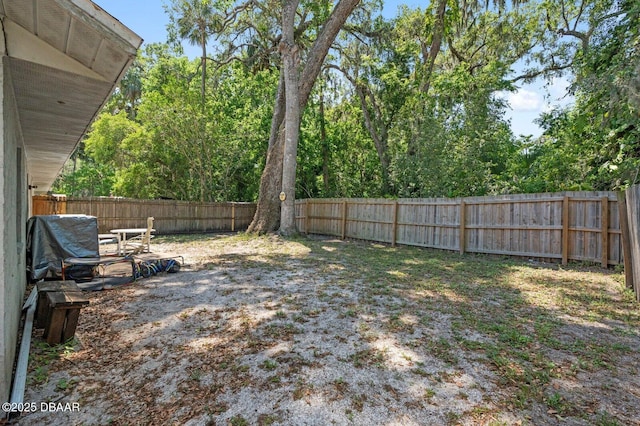 view of yard featuring a fenced backyard