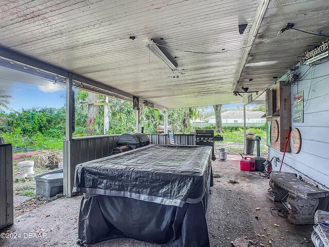 view of patio / terrace with area for grilling and ceiling fan