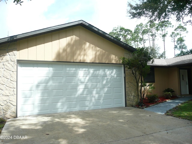 view of property exterior featuring a garage