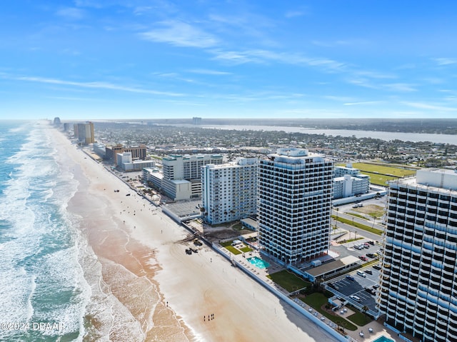 bird's eye view with a beach view and a water view