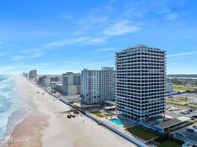 aerial view featuring a beach view and a water view