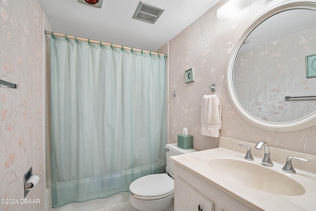 full bathroom with toilet, vanity, and shower / bath combo with shower curtain