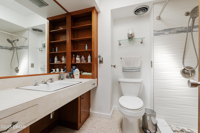 4245 Cardinal Blvd, Port Orange, FL 32127 - full bath with visible vents, toilet, baseboards, walk in shower, and speckled floor