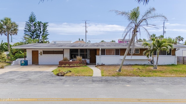 4245 Cardinal Blvd, Port Orange, FL 32127 - ranch-style home with a front yard
