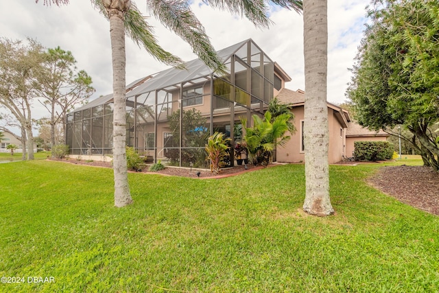 view of yard featuring glass enclosure