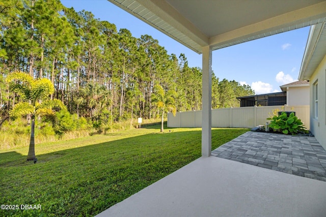 view of yard with a patio and fence