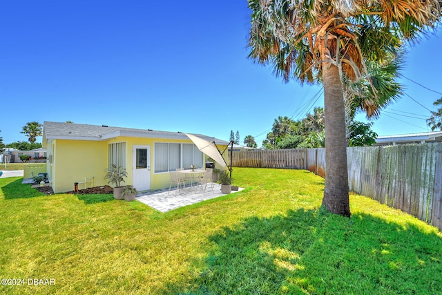 view of yard with a patio area