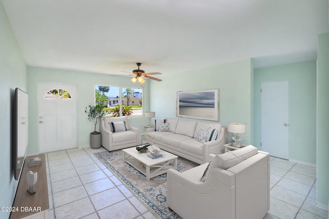 living room featuring light tile patterned flooring and ceiling fan