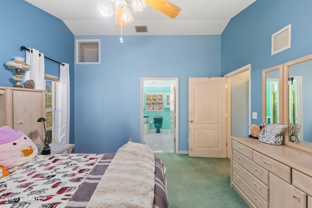 3531 Red Barn Ln, Ormond Beach, FL 32174 - carpeted bedroom with lofted ceiling, connected bathroom, and ceiling fan