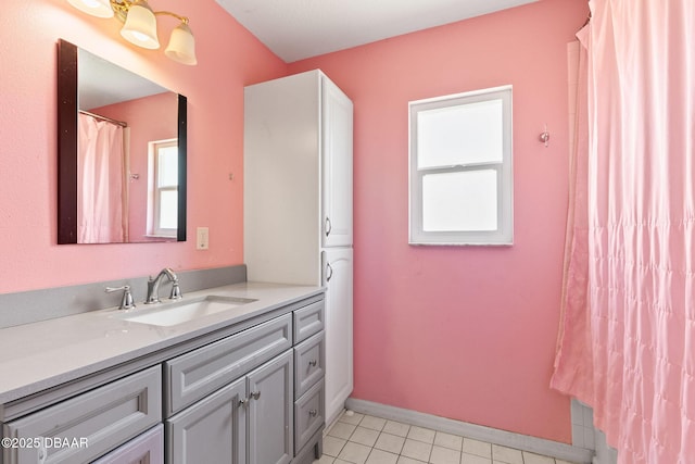 3531 Red Barn Ln, Ormond Beach, FL 32174 - bathroom featuring healthy amount of natural light, vanity, and tile patterned floors