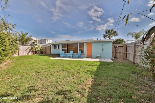 7 Azalea Dr, Ormond Beach, FL 32176 - back of property featuring a fenced backyard and a yard