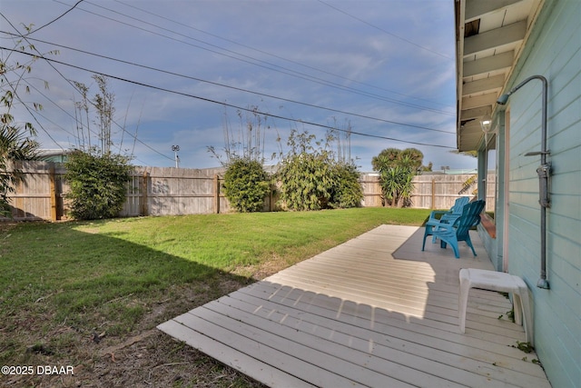 7 Azalea Dr, Ormond Beach, FL 32176 - deck with a lawn and a fenced backyard